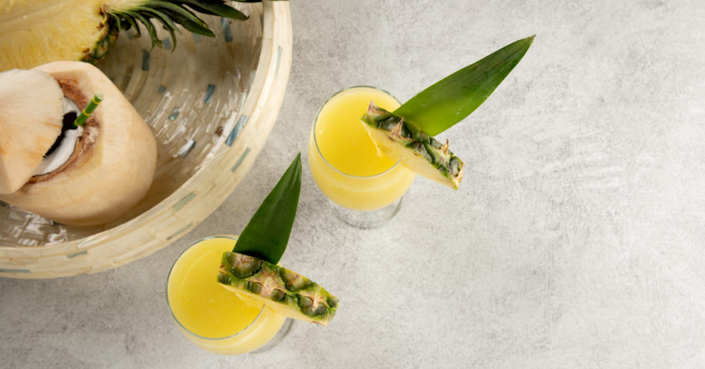 pineapple coconut juice overhead photo on a table